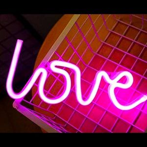 Pink neon light “love” sign
